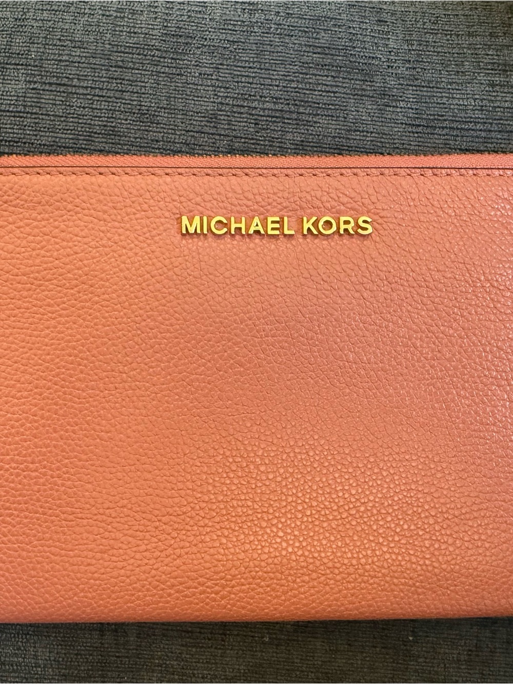 Michael Kors Orange Pebbled Leather Clutch with Gold Logo